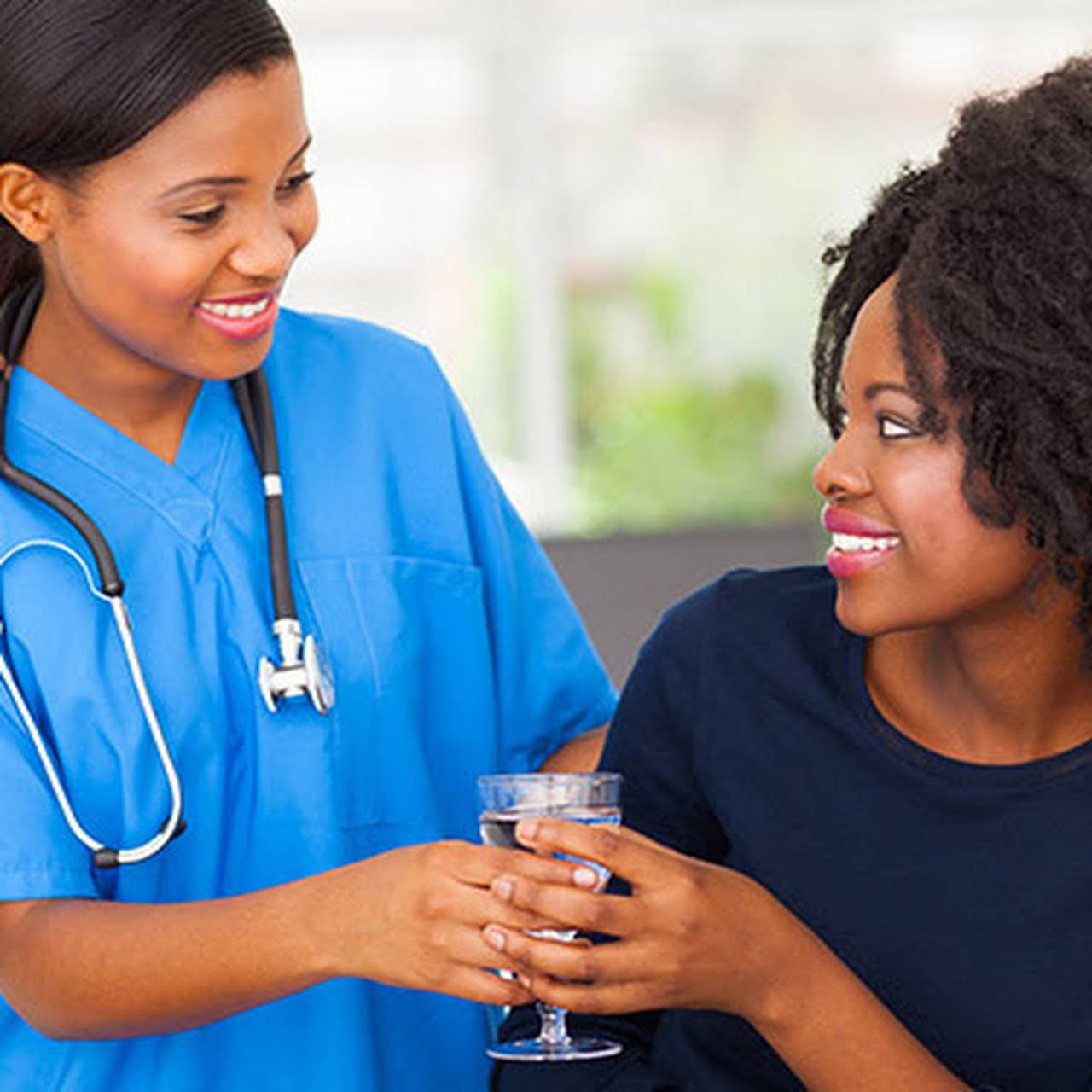 Nurse consulting with a patient at Joy Clinic South Africa